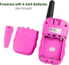 The back of a pink walkie-talkie is shown with the battery compartment open, revealing the battery slots. A clip and the battery cover are also visible. Produktbild-Vorschau