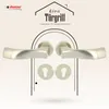 A marketing image showing two door handles and two rosettes against a patterned background with a house outline graphic. Produktbild-Vorschau