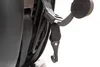 A close-up view of a black seatbelt strap and buckle attached to a car seat. Produktbild-Vorschau