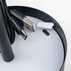 Close-up of USB-C and USB-A connectors and a small USB-C port on a white surface. Produktbild-Vorschau