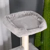 A close-up view of a multi-level cat tree with a plush gray lounging platform. Podgląd zdjęcia produktu