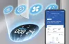 A digital display of an air purifier with various modes, next to a smartphone showing an air quality app. Podgląd zdjęcia produktu