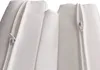 Close-up view of white fabric with zippers. Produktbild-Vorschau