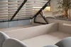 Close-up view of the internal mechanism and storage space of a bed frame. Produktbild-Vorschau