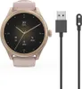 A smartwatch and its charging cable are displayed against a white background. Produktbild-Vorschau