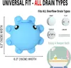 A blue octopus-shaped bath overflow drain cover is shown with text and diagrams explaining its features and compatibility. Produktbild-Vorschau