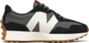 A side view of a New Balance 327 sneaker. Produktbild-Vorschau
