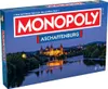 A Monopoly board game box featuring a city skyline at dusk. Produktbild-Vorschau