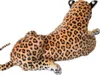 A plush toy leopard lying down, viewed from a high angle. Produktbild-Vorschau