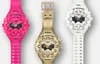 Three Casio G-Shock watches in different colors (pink, gold, and white) are displayed side-by-side against a white background. Voir les images du produit