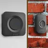 A split image showing two wireless doorbells. The left side shows a doorbell mounted on a white wall, and the right side shows a doorbell mounted on a brick wall. Produktbild-Vorschau