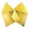 A folded paper fortune teller or cootie catcher made of yellow paper. Voir les images du produit