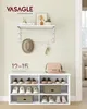 A shoe bench with shoes, a hat, and a bag displayed in a hallway or entryway. Produktbild-Vorschau