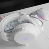 A white gaming headset, keyboard, and mouse are arranged on a white desk. Anteprima dell’immagine prodotto