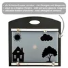 A shadow theatre with cutouts of a sun, cloud, house, and tree. Náhľad obrázku produktu