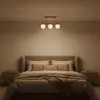 A bedroom scene with a bed and a ceiling light. Náhľad obrázku produktu