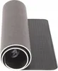 A rolled-up desk mat is shown against a white background. Produktbild-Vorschau