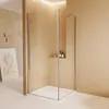 A modern bathroom with a glass shower enclosure. Anteprima dell’immagine prodotto