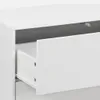 A close-up view of an open drawer in a white cabinet. Anteprima dell’immagine prodotto