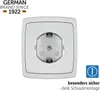 A white electrical socket with a screw mount, presented against a white background. Text overlays indicate brand information and a safety feature. Náhľad obrázku produktu