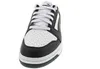 A close-up, front-facing view of a black and white Puma sneaker against a white background. Podgląd zdjęcia produktu