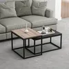 A living room scene with a sofa and two nesting coffee tables. Anteprima dell’immagine prodotto