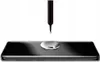 A drop of liquid is falling from a black applicator onto a black smartphone screen. Náhľad obrázku produktu