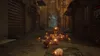 A cat walks through a dark alleyway illuminated by many small, glowing orange lights. Produktbild-Vorschau