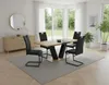 A dining room with a table and chairs set up. Produktbild-Vorschau