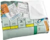 A folded blanket with a Monopoly game board pattern, showing various properties and cards. Produktbild-Vorschau