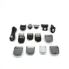 A collection of grooming attachments and a USB charging cable are laid out on a white background. Produktbild-Vorschau