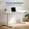 A white standing desk with a laptop and a cup on it, set in an office environment. Anteprima dell’immagine prodotto