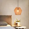 A bedroom scene with a bedside table and a hanging lamp. Produktbild-Vorschau