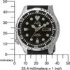 A close-up of a men's wristwatch with a ruler for scale. Produktbild-Vorschau