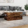 A living room scene with a grey sofa, a wooden coffee table, and a plant. Podgląd zdjęcia produktu