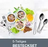A flat lay of cutlery and food items arranged on a white wooden surface, with text overlay at the bottom. Produktbild-Vorschau