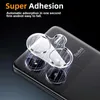 A close-up shot of a smartphone camera lens protector being applied to a phone. Produktbild-Vorschau