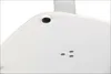A close-up view of the underside of a white table base, showing the feet and mounting points. Voir les images du produit