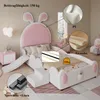 A child's bed with a bunny theme, featuring a slide and stairs, set in a bedroom. Anteprima dell’immagine prodotto