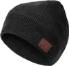 A dark gray knitted beanie with a brown leather patch on the side. Anteprima dell’immagine prodotto