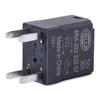 A single black automotive relay with silver metal prongs, shown at a diagonal angle against a white background. Podgląd zdjęcia produktu