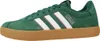 A side view of a green Adidas sneaker with white stripes and a gum sole. Produktbild-Vorschau