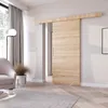 A modern living room with a sliding door, armchair, and rug. Produktbild-Vorschau