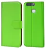 A green flip case for a Huawei P9 phone, shown open and closed. Náhled obrázku produktu