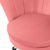 A close-up view of a pink velvet office chair with a shell-shaped back. Náhľad obrázku produktu