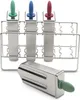 A set of stainless steel ice pop molds with colored handles and a stand, with one mold detached in the foreground. Produktbild-Vorschau