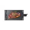 A steak is shown on a black electric grill. Anteprima dell’immagine prodotto