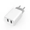 A white dual-port USB charger with gray prongs against a white background. Produktbild-Vorschau