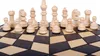 A set of white and brown chess pieces arranged on a chessboard. Anteprima dell’immagine prodotto