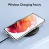 A smartphone in a clear case is placed on a wireless charging pad. Produktbild-Vorschau